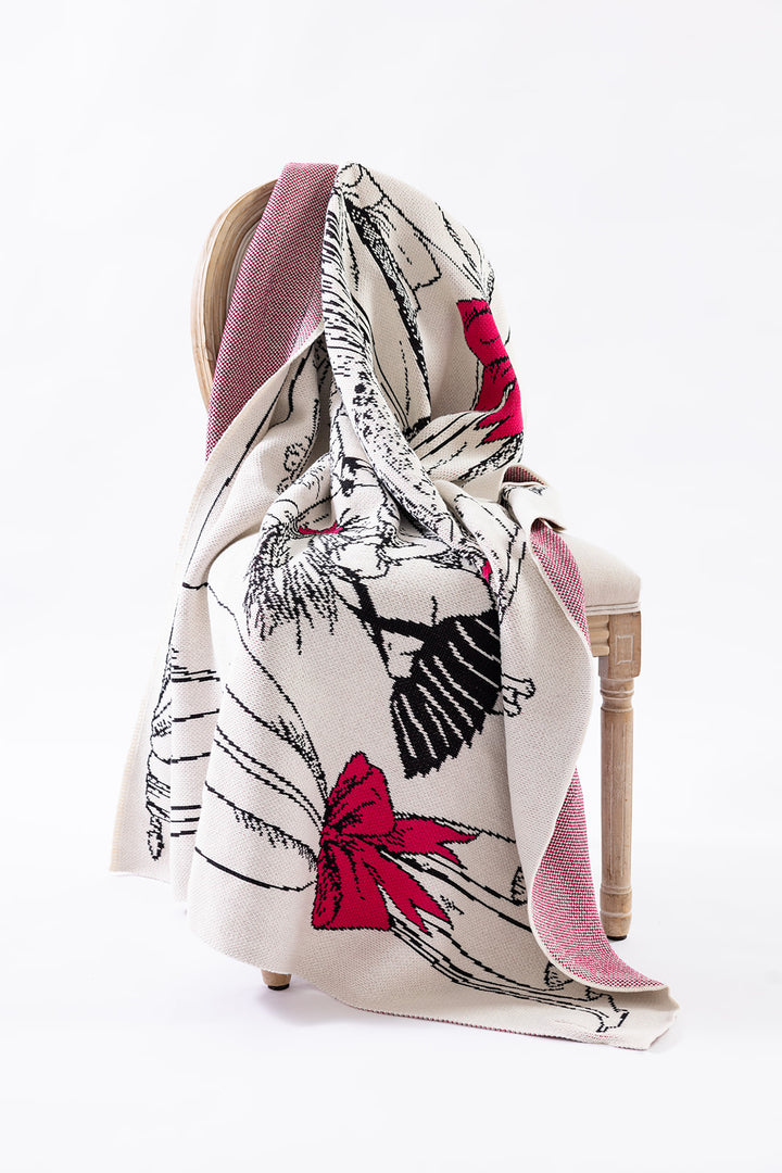 Window Shopping an Eloise Collection Knit Blanket