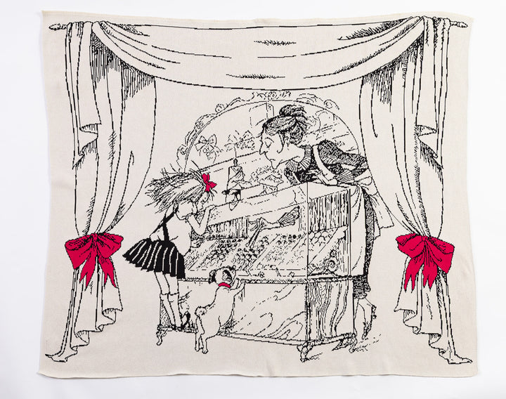 Window Shopping an Eloise Collection Knit Blanket